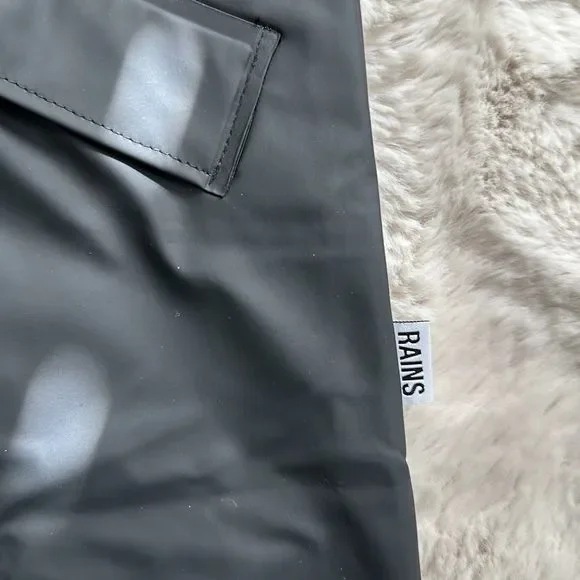 Rains Unisex Waterproof Long Reflective Jacket in Black